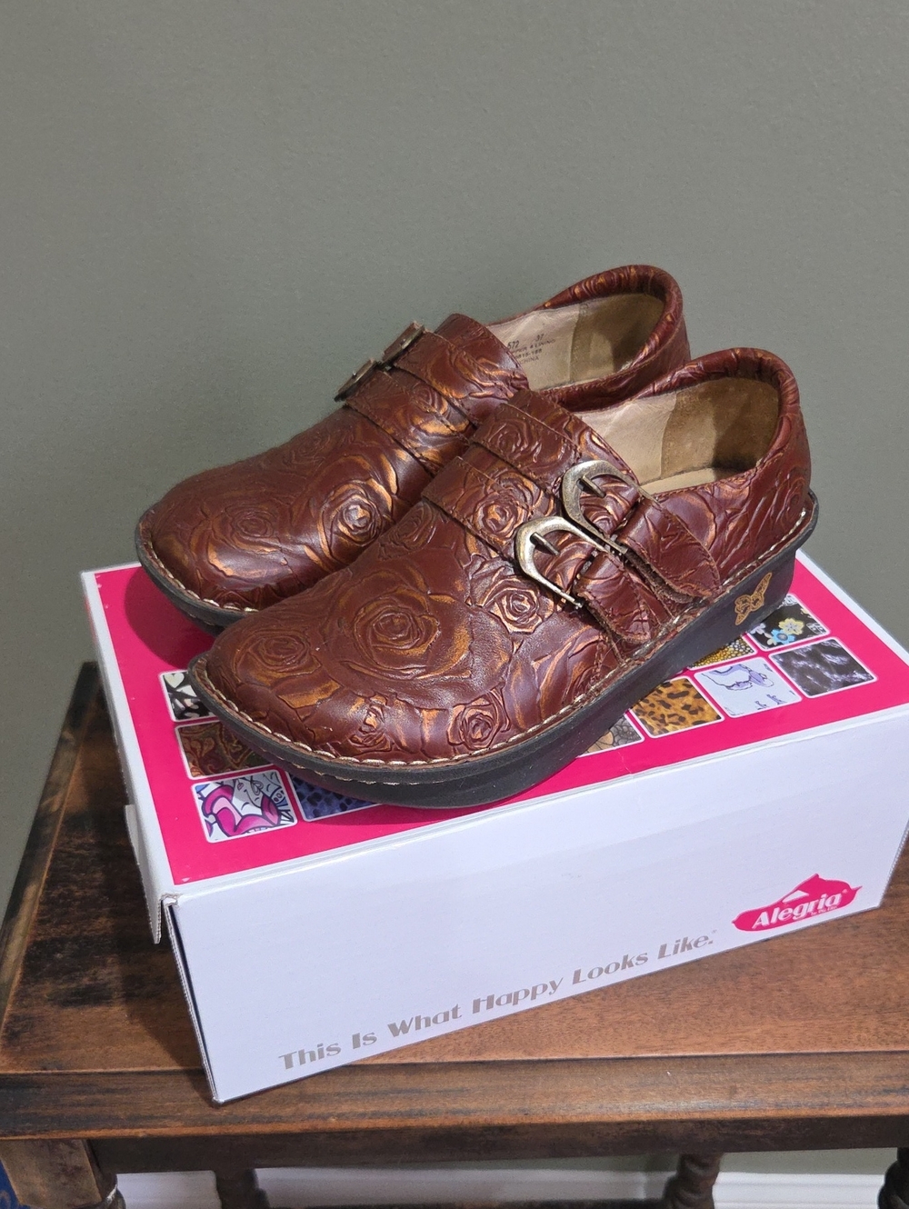Alegria Brown Floral Embossed Clogs with Buckle Detail